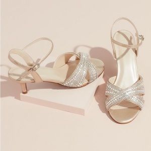 David’s Bridal crisscross heels with adjustable strap. Size 8.5 with a 2” heel.